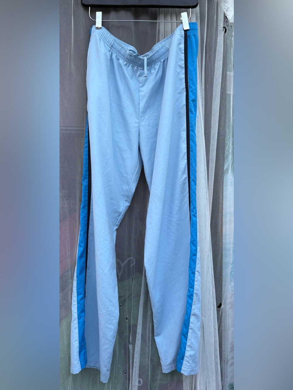 Vintage Nike Light Blue Track Pants with Blue Side Stripes